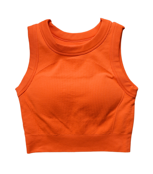 Jolly Ribbed Tank in Orange – ribbed sleeveless top with a built-in bra pad, made from soft, breathable stretch fabric