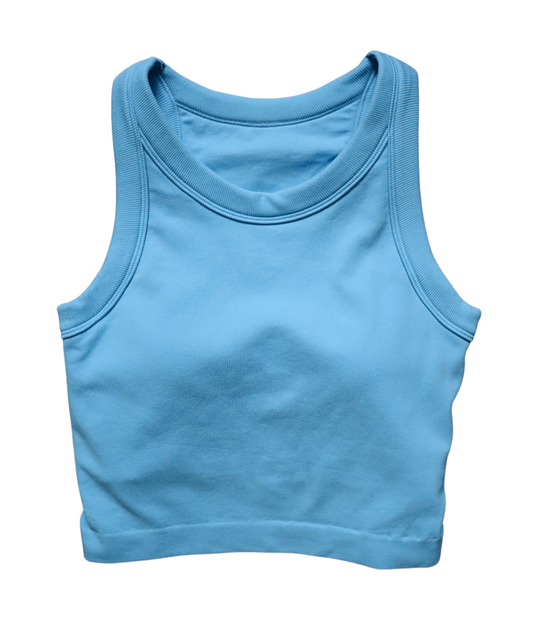 Cropped ribbed sports tank with built-in bra in pink and blue. Breathable, stretchy, and form-fitting for workouts or everyday wear.