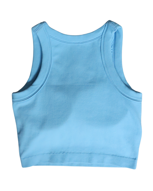 Cropped ribbed sports tank with built-in bra in pink and blue. Breathable, stretchy, and form-fitting for workouts or everyday wear.