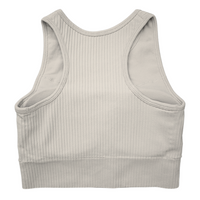 Tessa Ribbed Bra – ultra-stretch, seamless ribbed sports bra with light compression, breathable fabric, and a sculpted fit. Perfect for yoga, gym workouts, and athleisure styling.