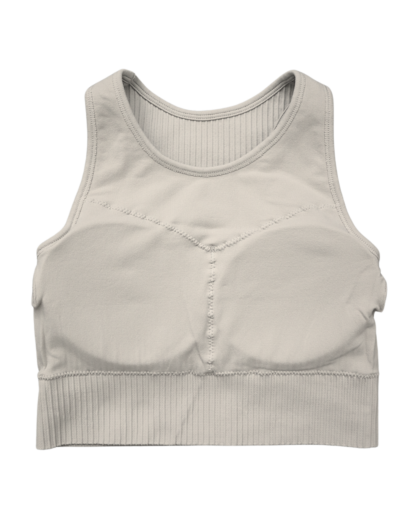 Tessa Ribbed Bra – ultra-stretch, seamless ribbed sports bra with light compression, breathable fabric, and a sculpted fit. Perfect for yoga, gym workouts, and athleisure styling.