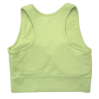 Tessa Ribbed Bra – ultra-stretch, seamless ribbed sports bra with light compression, breathable fabric, and a sculpted fit. Perfect for yoga, gym workouts, and athleisure styling.